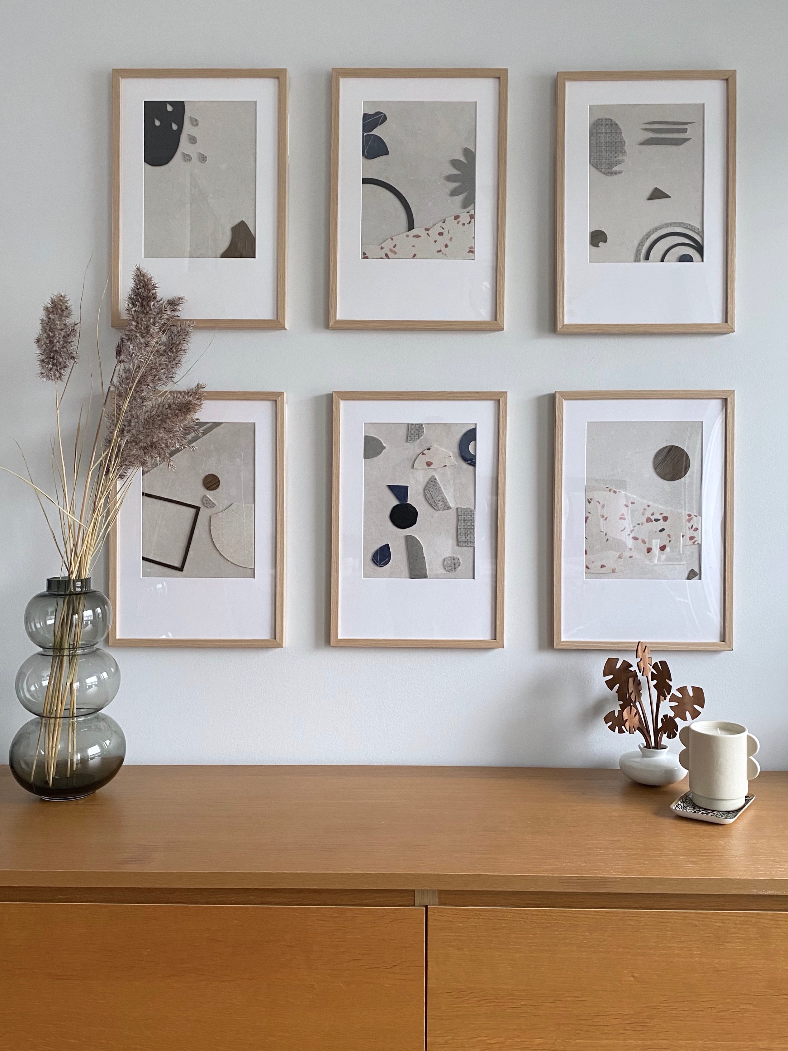 Un mur de cadre arty et épuré Un mur de cadre arty et épuré